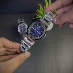 Patek phillipe nautilus front view with navy blue dailer & silver straps