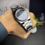 Tissot PRX Black with white straps & black dialer in wrist view