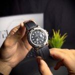 Rolex submariner in circular black dialer with white border & plane black straps