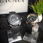Rolex submariner in balck & golden shades wrist view with circular plane light black straps
