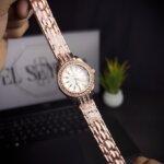 Women watch hexicle rose-gold front view with golden straps