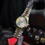 Rolex Date-Just two tone jubilee bracelet with white dialer & golden-silve straps in side view