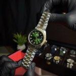Rolex day-date two tone with green dialer & golden-silver straps in natural look