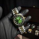 Rolex day-date two tone with green dialer & golden-silver straps
