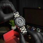 Magnetic balls movement front wrist view with black straps