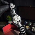 Magnetic balls movement in back view with black straps & butterfly lock