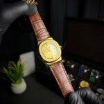 Patek phillippe Geneve golden border view with brown straps